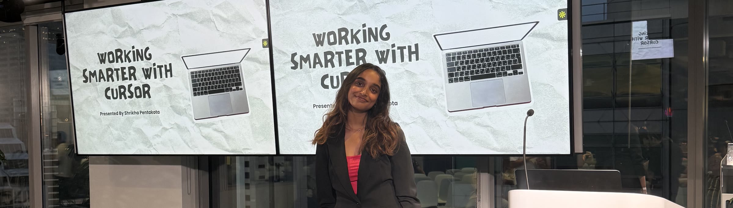 Shrikha on stage presenting Working Smarter with Cursor